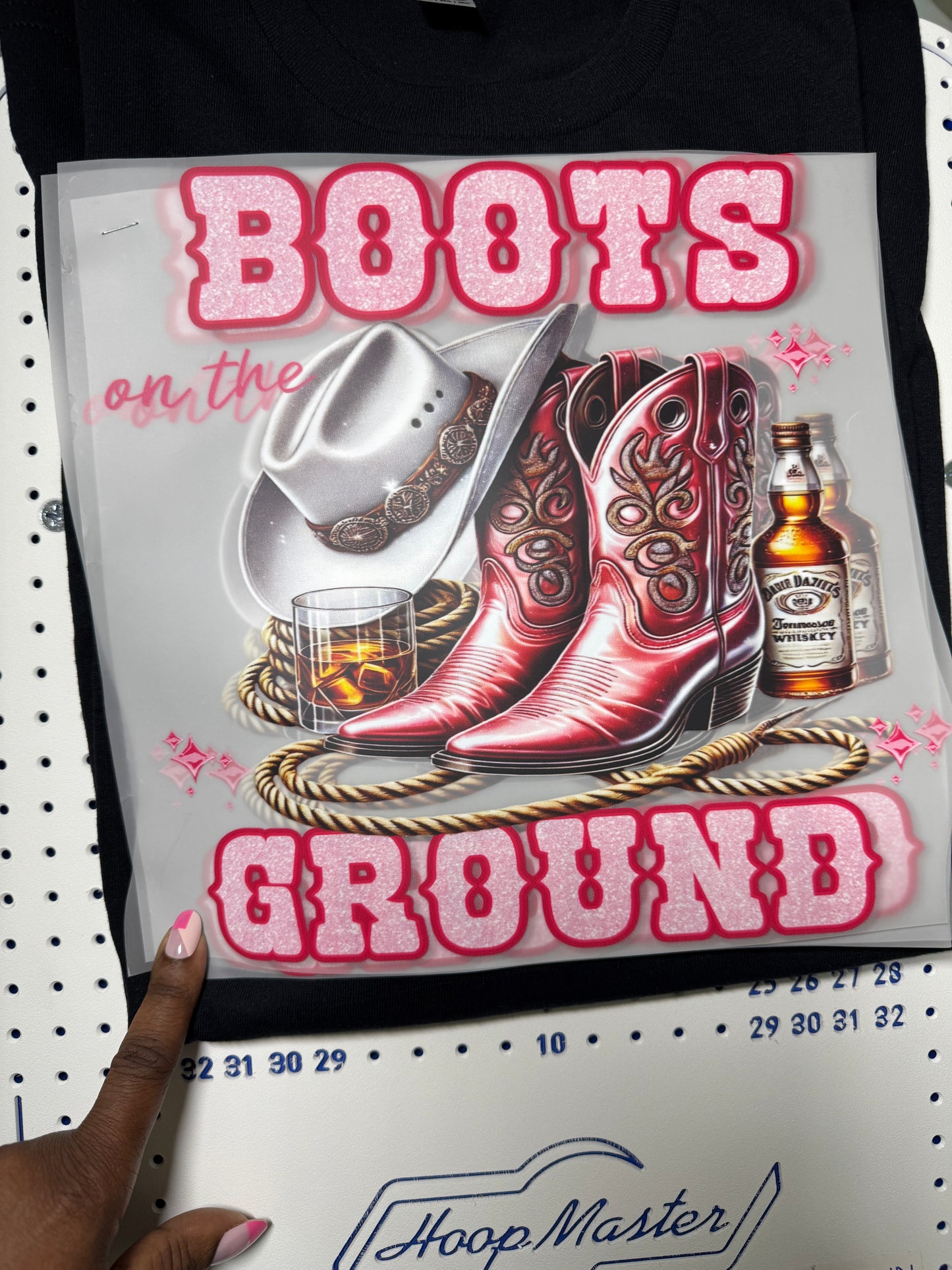 Pink boots on the ground tshirt with lasso and beverage design