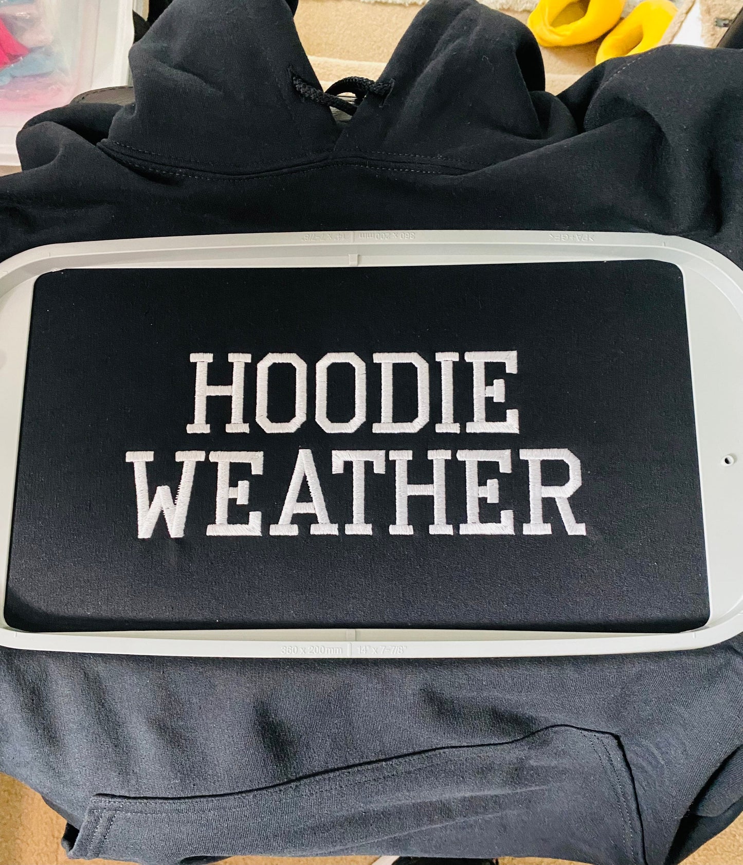 Embroidered Hoodie Weather saying hoodie