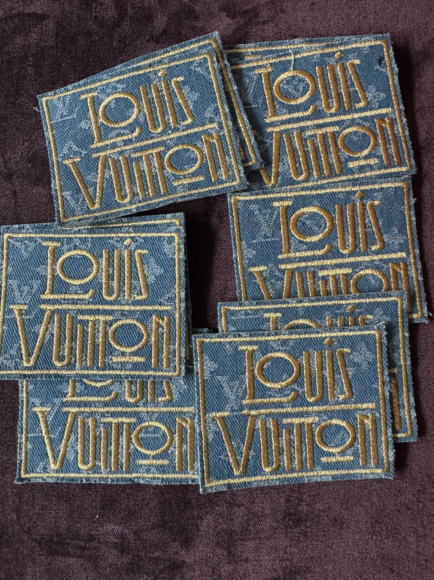 LV inspired embroidery square patch, light denim material with fancy writing in gold