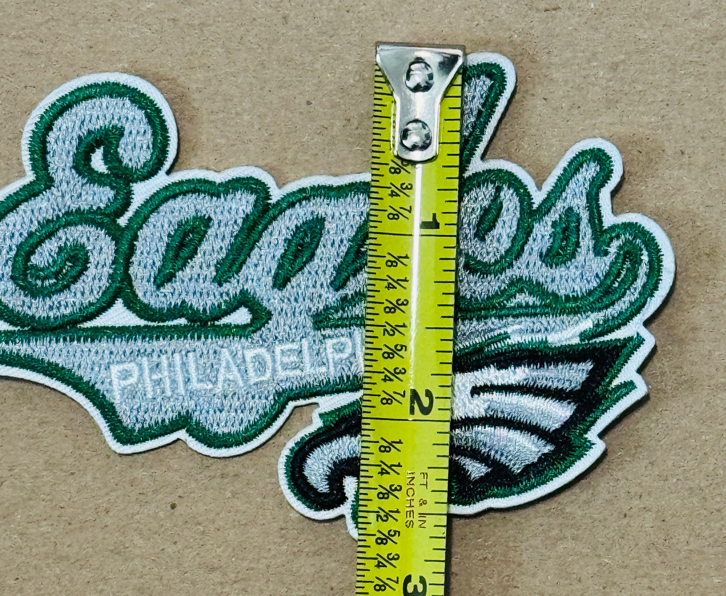 Eagles embroidery patch, cursive writing with Philadelphia embroidered on it