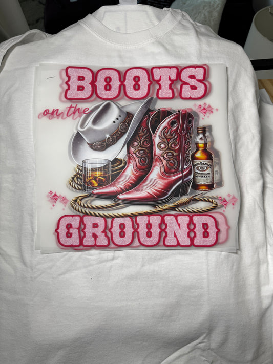 Pink boots on the ground tshirt with lasso and beverage design